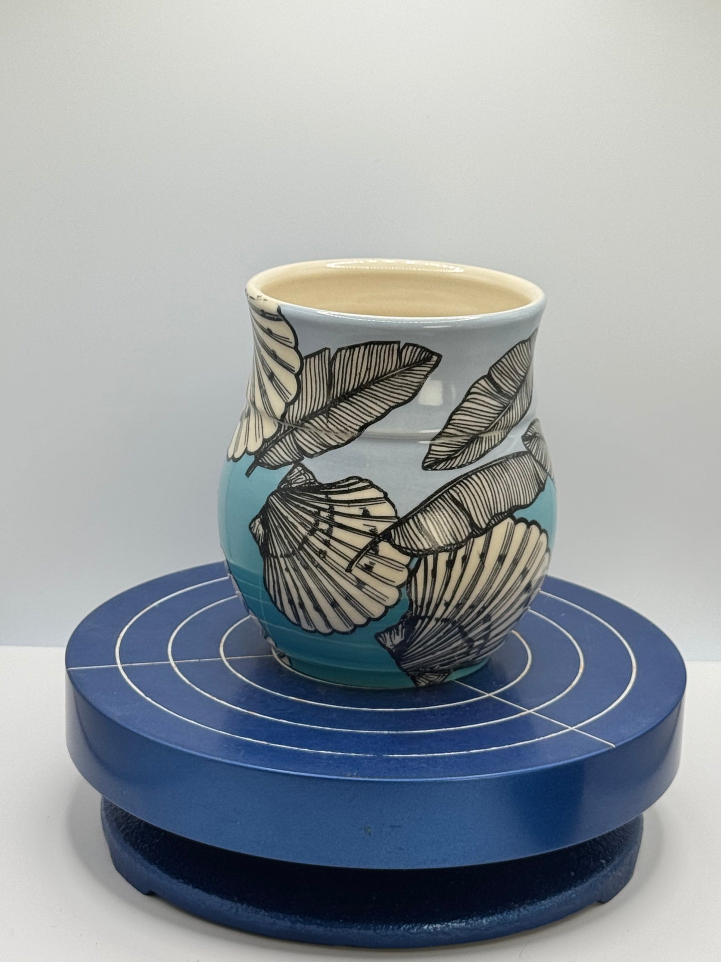 Shells and Banana Leaves in Blue Ombré Stoneware Coffee and Tea Mug