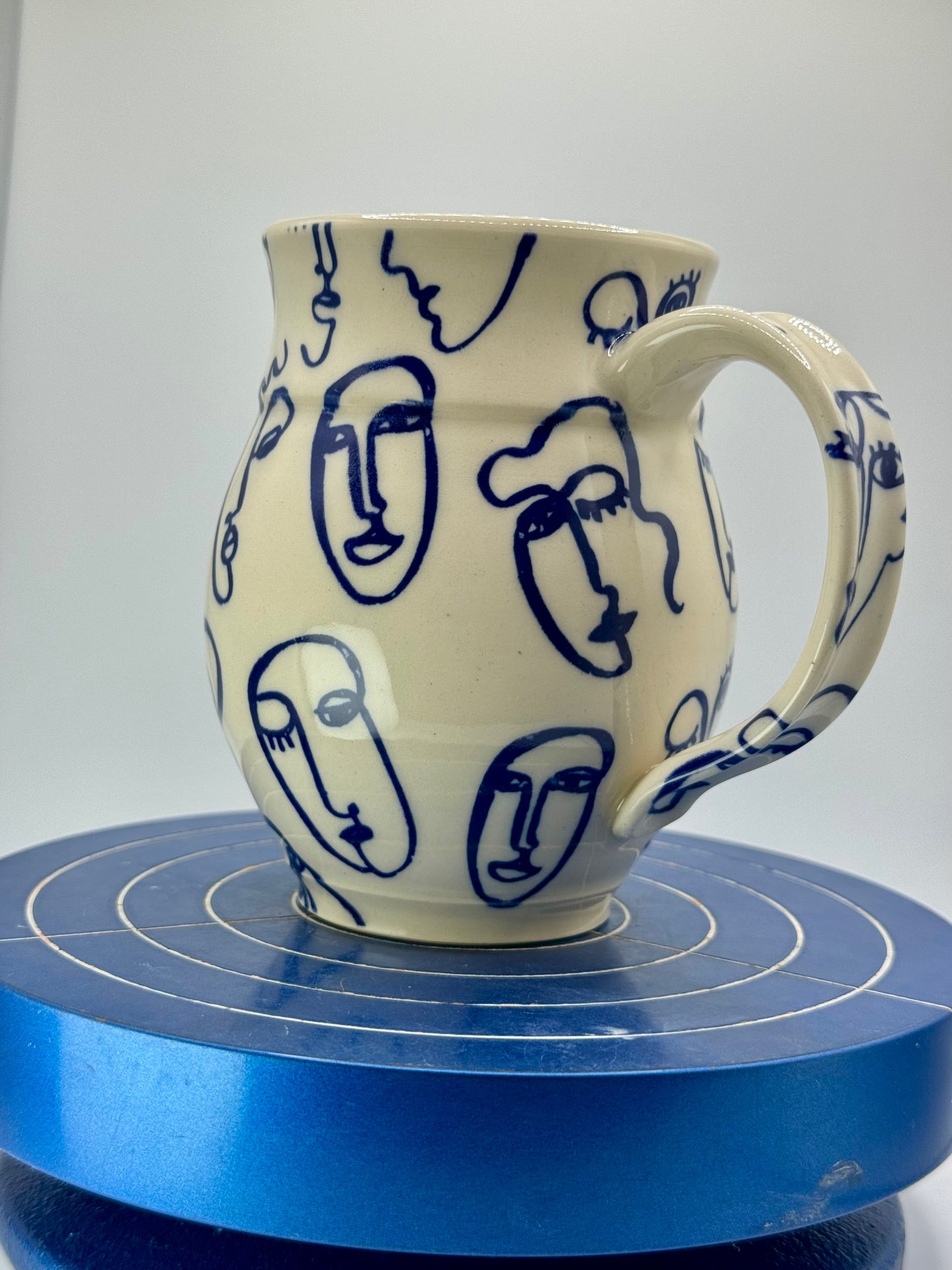 Blue Abstract Faces Stoneware Coffee and Tea Mug
