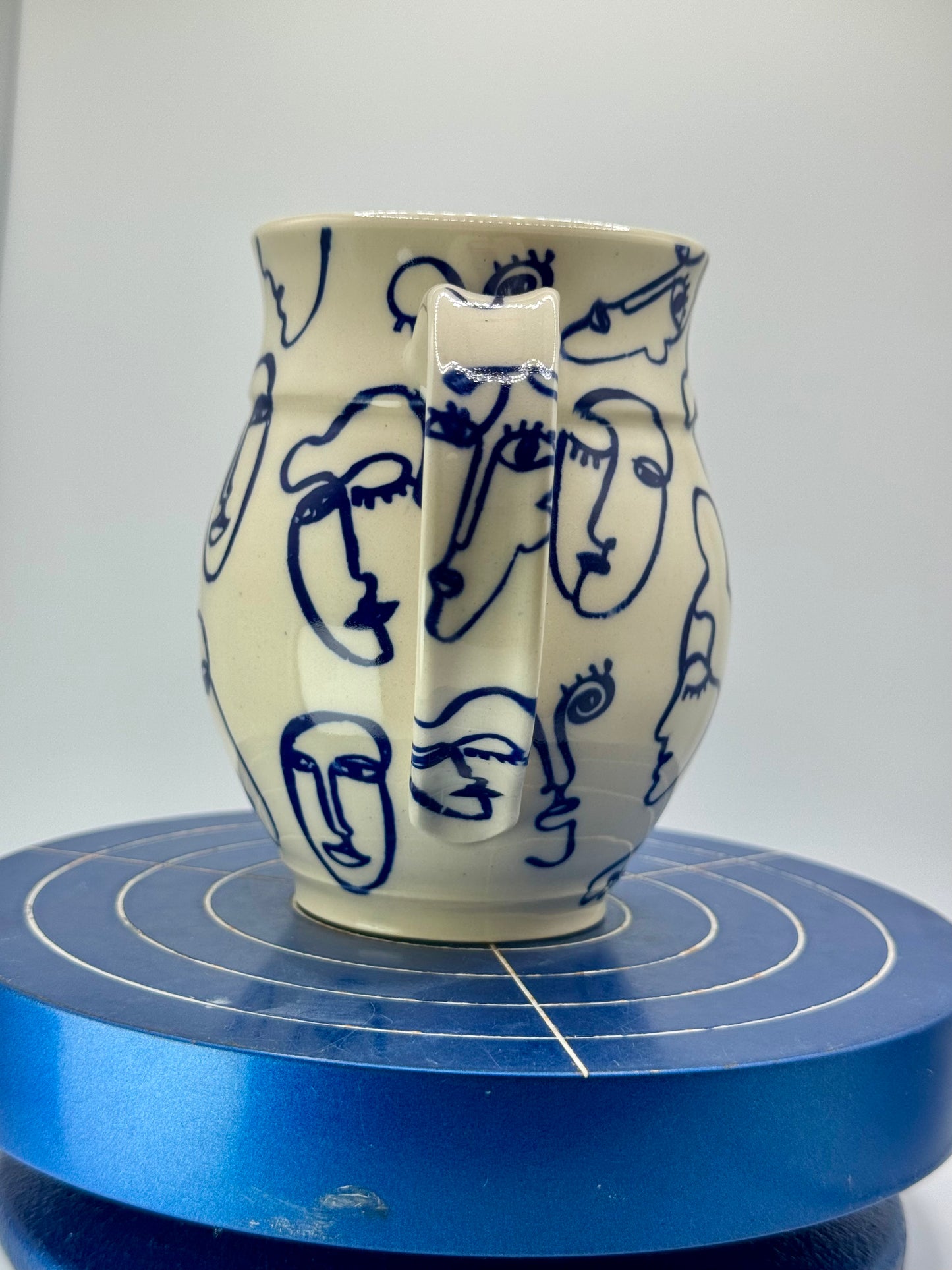 Blue Abstract Faces Stoneware Coffee and Tea Mug