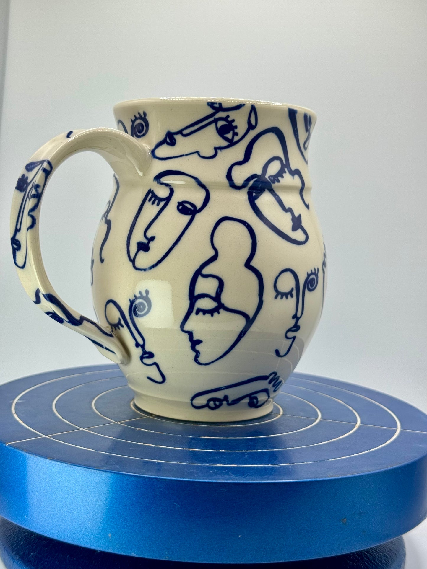 Blue Abstract Faces Stoneware Coffee and Tea Mug